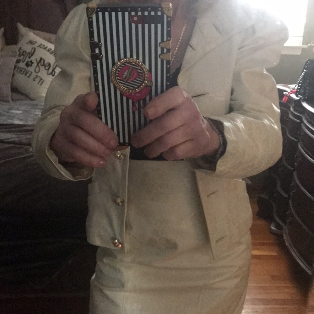 This is a Beautiful off white leather suit